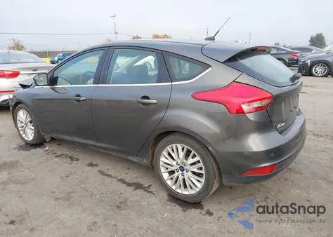 2016 Ford Focus Titanium z USA, uszkodzony, nr VIN 1FADP3N2XGL293994